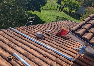 Nettoyage / démoussage de toiture en tuiles